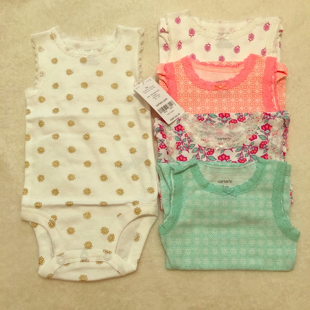 Carter’s girl 3 month onsies. New with tags.